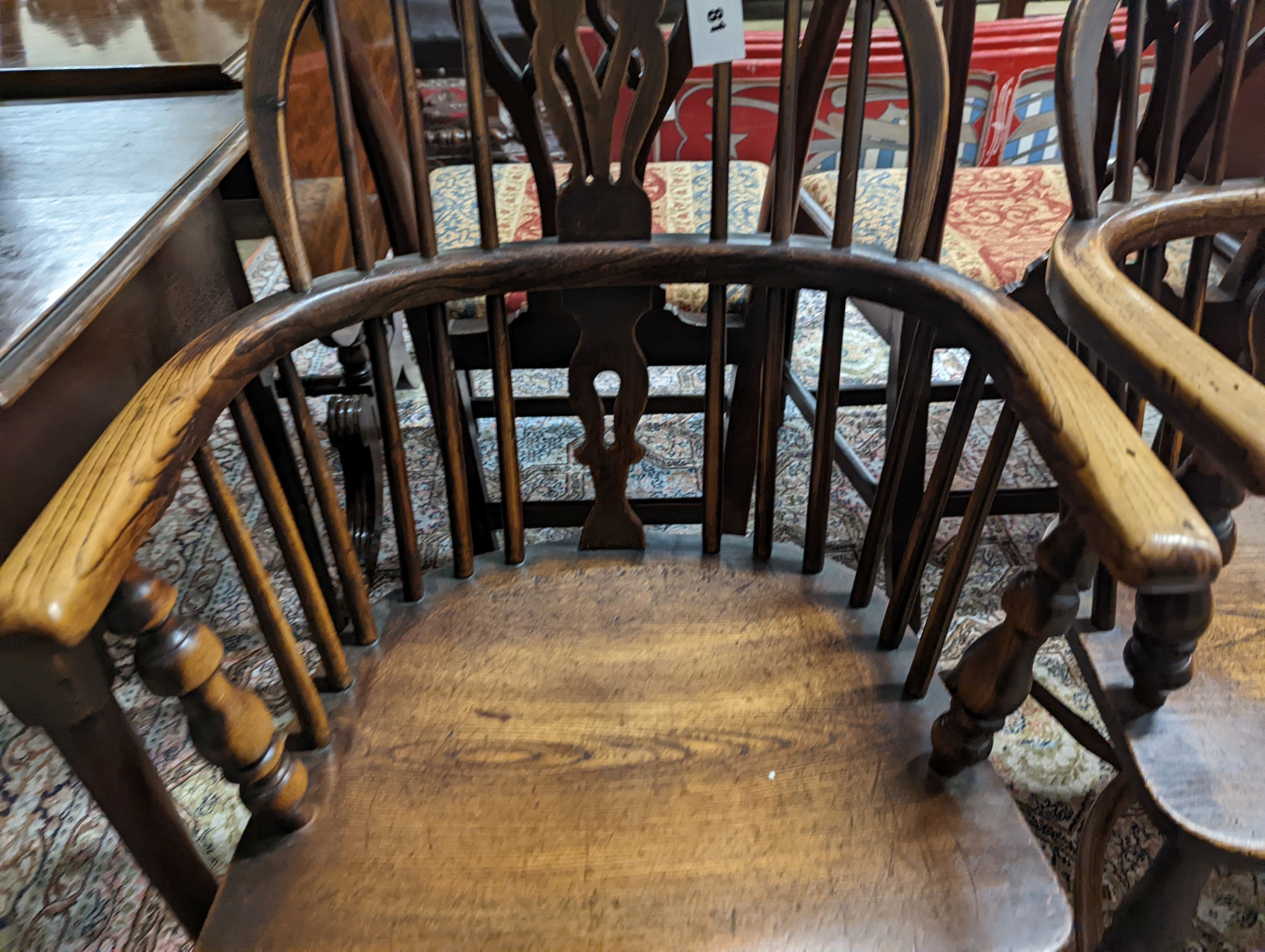 A pair of early 19th century ash and elm Windsor chairs. H-87cm.